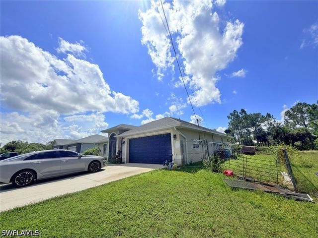 1226 Milwaukee BLVD, Lehigh Acres, FL 33974
