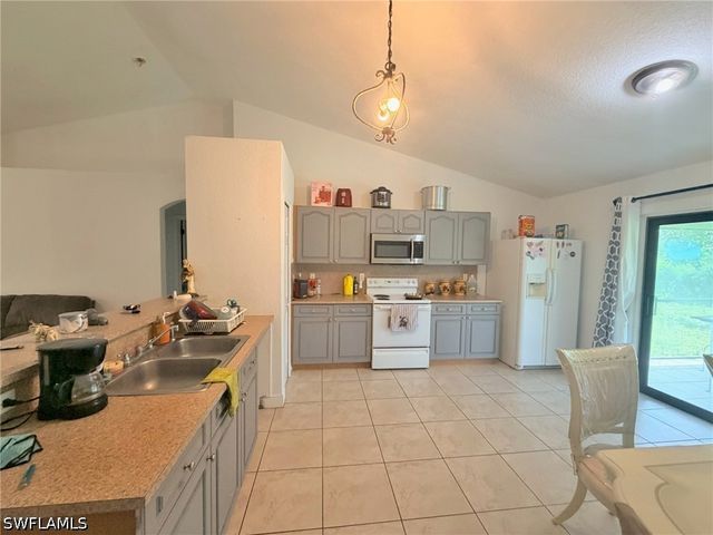 1226 Milwaukee BLVD, Lehigh Acres, FL 33974