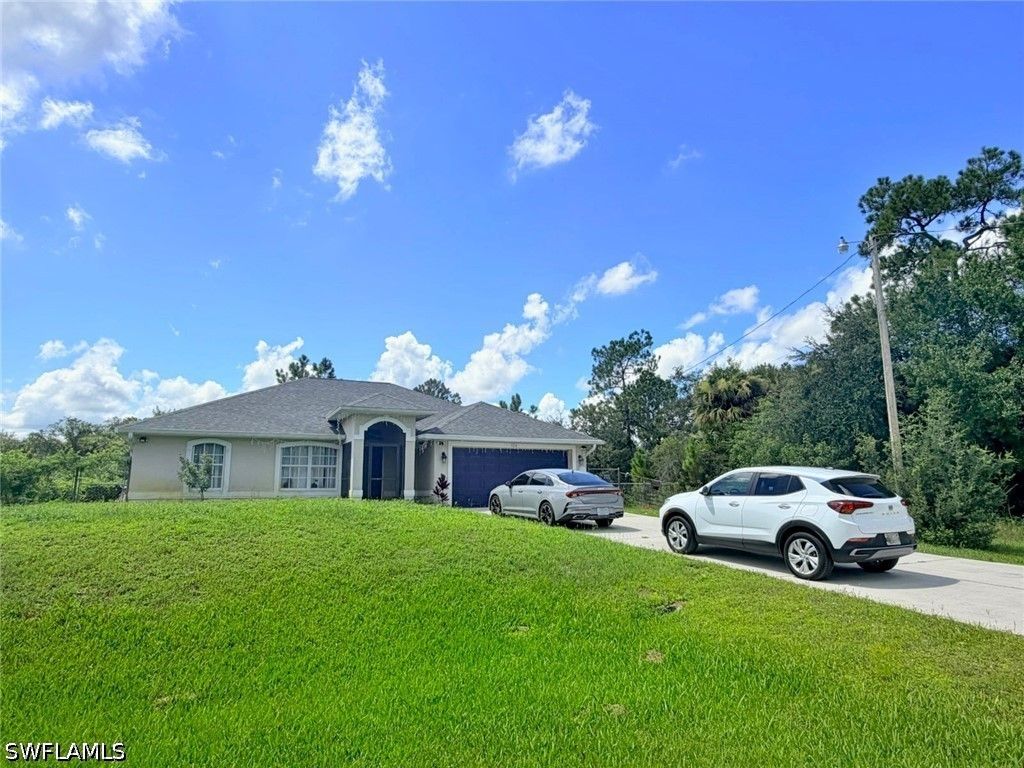 1226 Milwaukee BLVD, Lehigh Acres, FL 33974