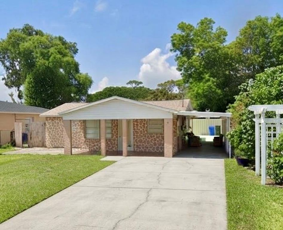 Image 1 of property listing at 7210 N HUBERT AVENUE, Tampa, FL 33614