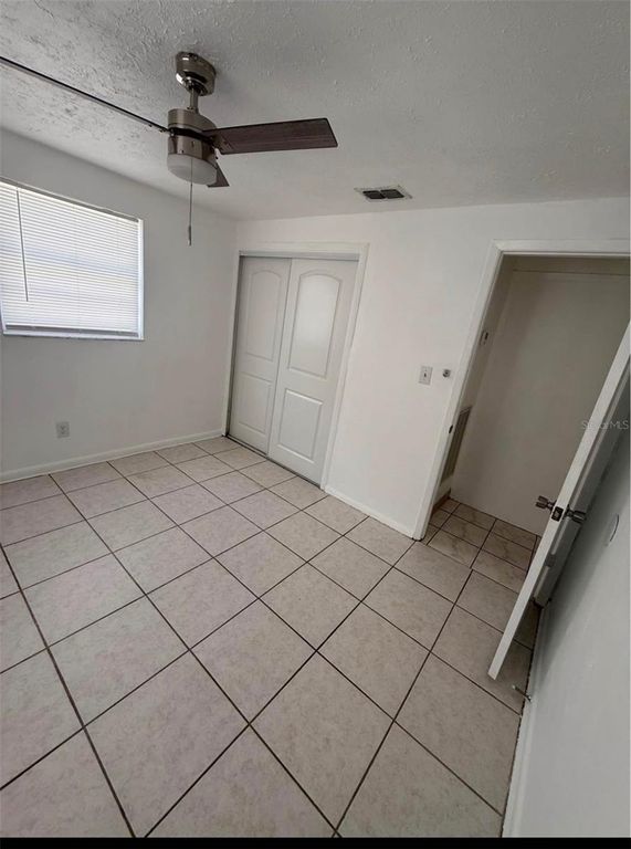 Image 7 of property listing at 7210 N HUBERT AVENUE, Tampa, FL 33614