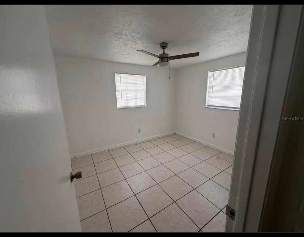 Image 8 of property listing at 7210 N HUBERT AVENUE, Tampa, FL 33614
