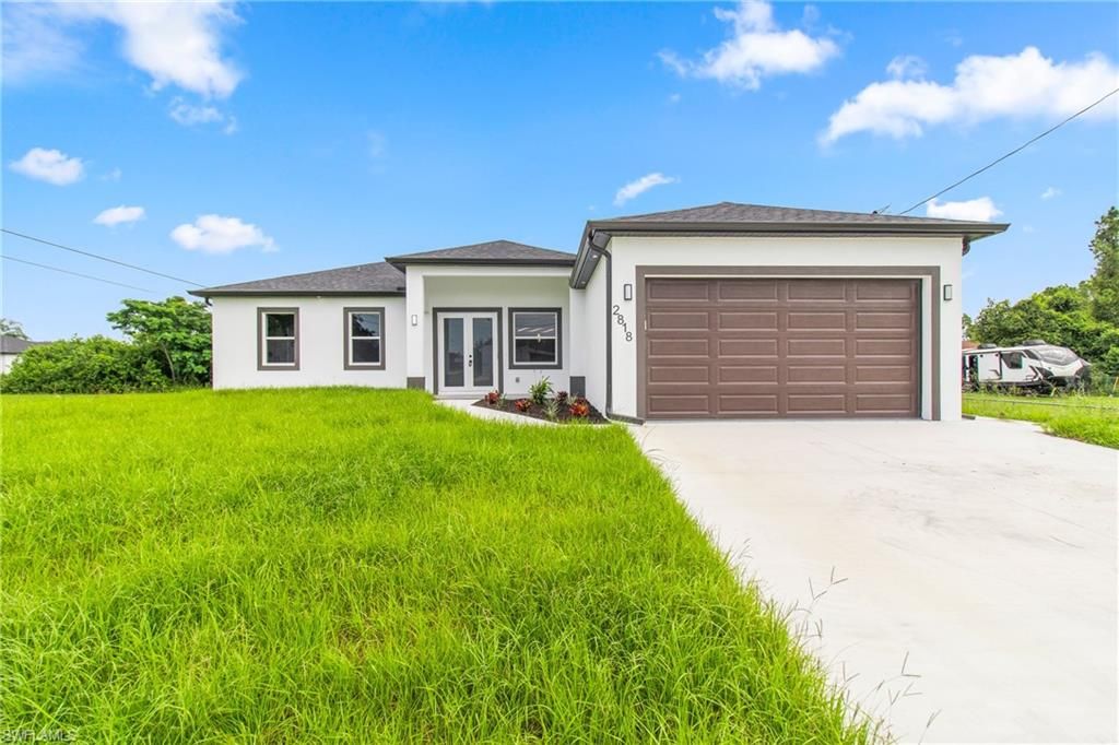 2818 42nd ST SW, LEHIGH ACRES, FL 33976 — exterior