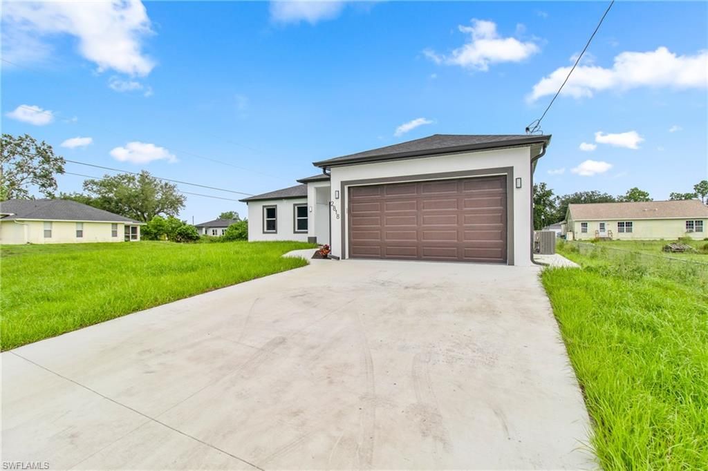2818 42nd ST SW, LEHIGH ACRES, FL 33976 — photo 3