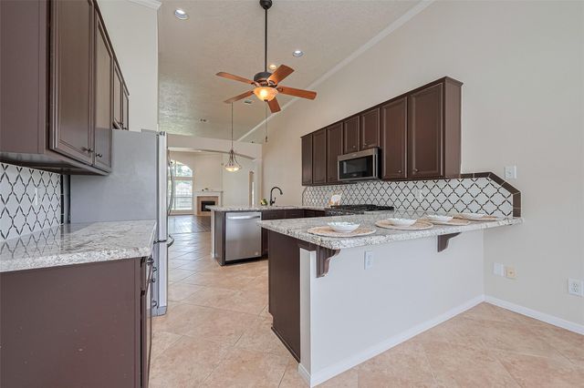 5165 Greenwater Drive, Willis, TX 77318