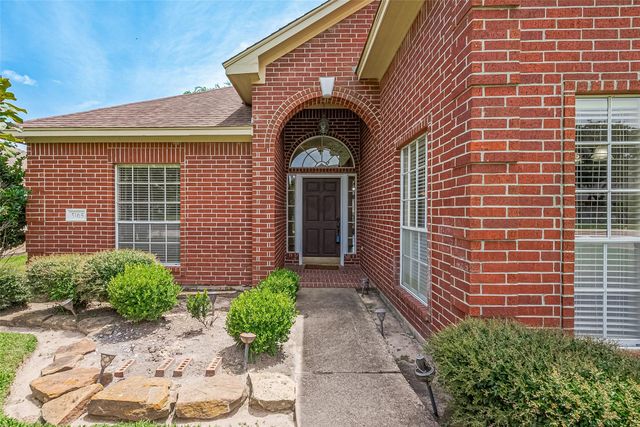 5165 Greenwater Drive, Willis, TX 77318