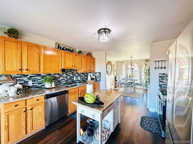 55657 E Apache Place, Strasburg, CO 80136