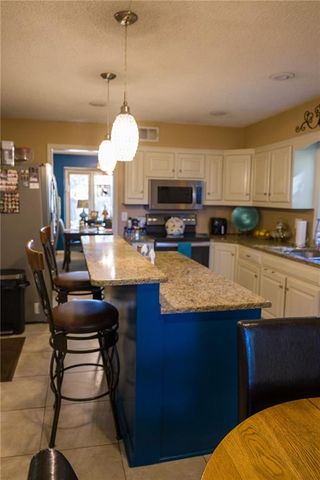 1513 NW Weatherstone Court, Blue Springs, MO 64015