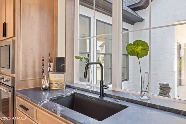 207 Sabal Bend Drive, Youngsville, LA 70592