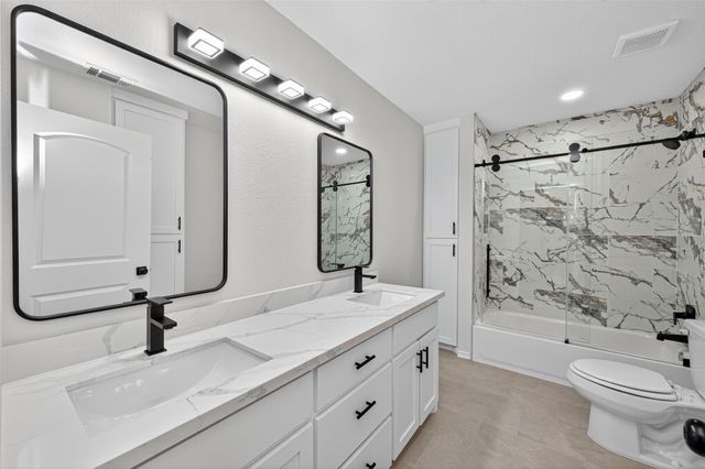 10594 Rustling Oaks Drive, Conroe, TX 77303