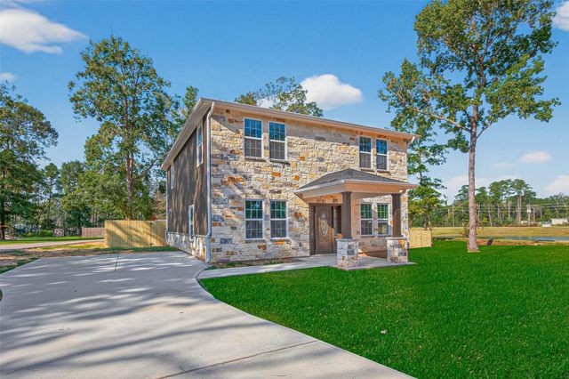 10594 Rustling Oaks Drive, Conroe, TX 77303