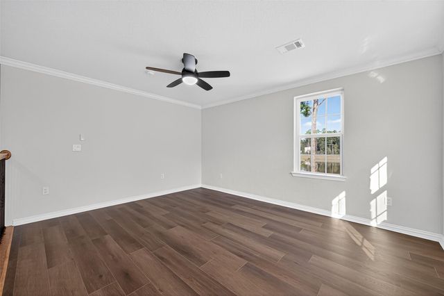 10594 Rustling Oaks Drive, Conroe, TX 77303