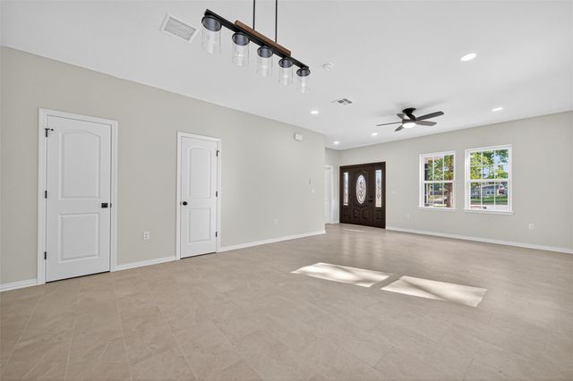 10594 Rustling Oaks Drive, Conroe, TX 77303