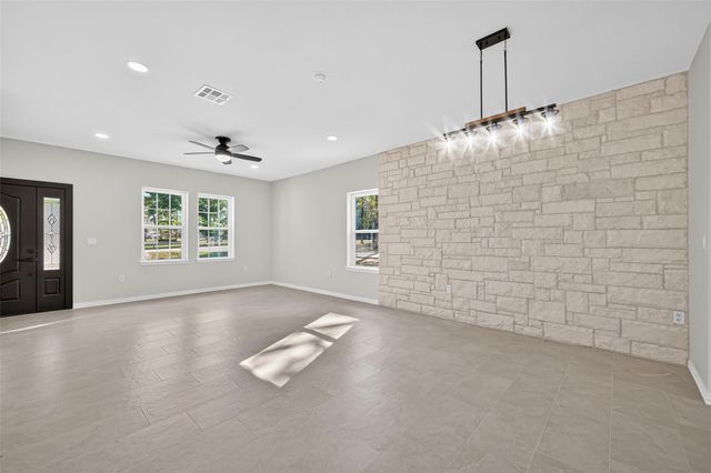 10594 Rustling Oaks Drive, Conroe, TX 77303