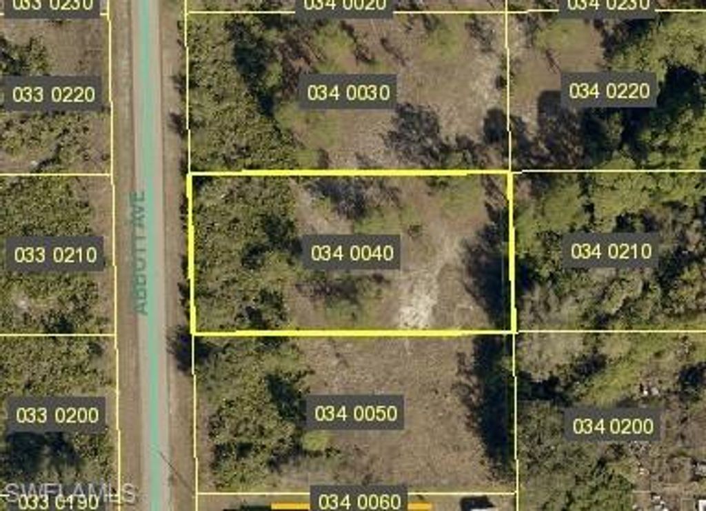 616 Abbott AVE NW, LEHIGH ACRES, FL 33972 — exterior