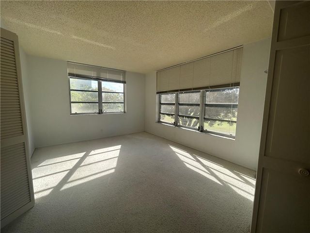 3970 OAKS CLUBHOUSE Drive 310, Pompano Beach, FL 33069