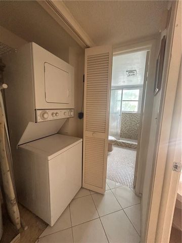 3970 OAKS CLUBHOUSE Drive 310, Pompano Beach, FL 33069