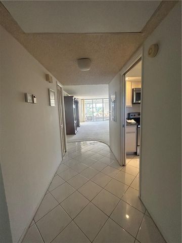 3970 OAKS CLUBHOUSE Drive 310, Pompano Beach, FL 33069