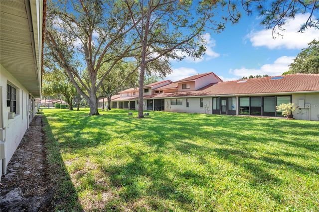 7736 WINDBREAK ROAD, Orlando, FL 32819
