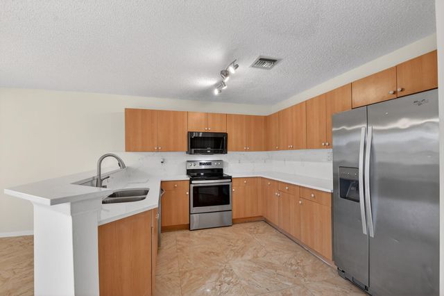 738 Perdido Heights Drive, West Palm Beach, FL 33413