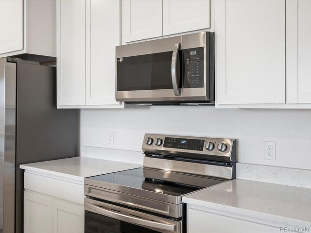 6153 N Ceylon St 3-302, Denver, CO 80239