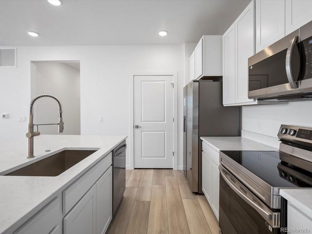 6153 N Ceylon St 3-302, Denver, CO 80239