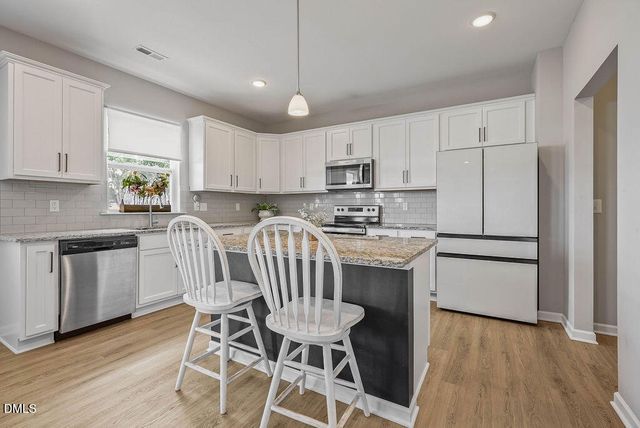 60 Olivia Crossing Court, Four Oaks, NC 27524