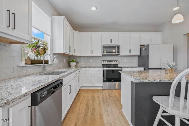 60 Olivia Crossing Court, Four Oaks, NC 27524