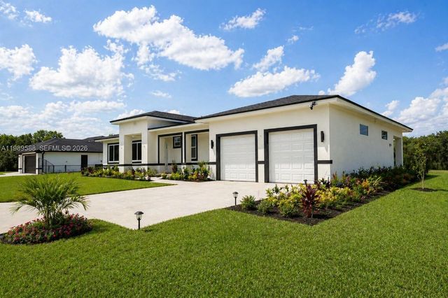1715 Mcarthur Avenue, Lehigh Acres, FL 33972