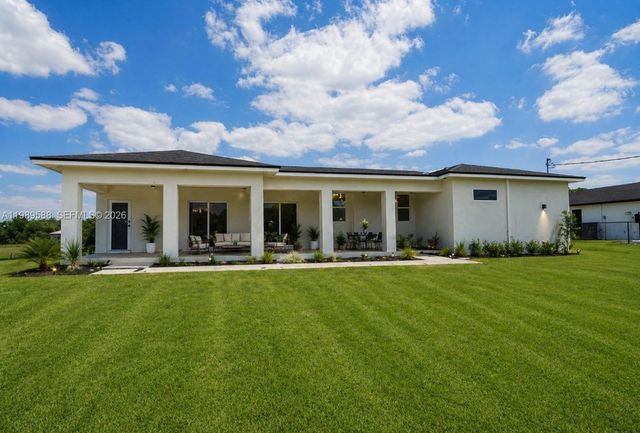 1715 Mcarthur Avenue, Lehigh Acres, FL 33972