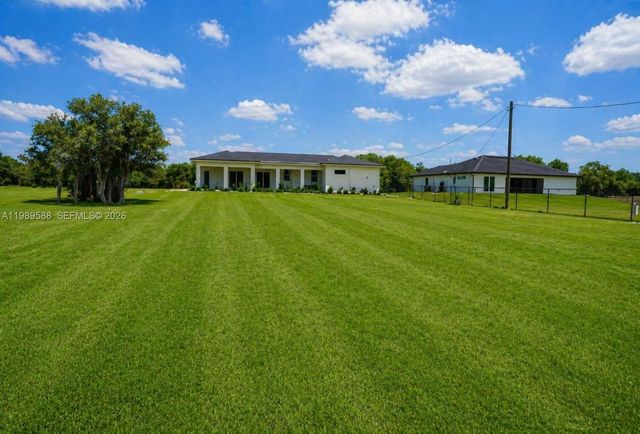1715 Mcarthur Avenue, Lehigh Acres, FL 33972