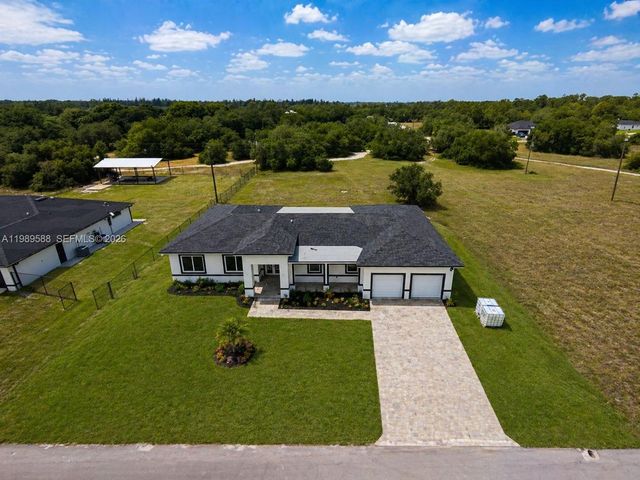 1715 Mcarthur Avenue, Lehigh Acres, FL 33972