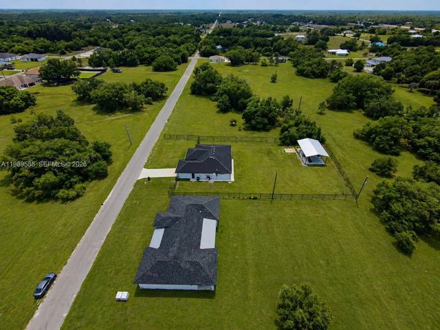 1715 Mcarthur Avenue, Lehigh Acres, FL 33972