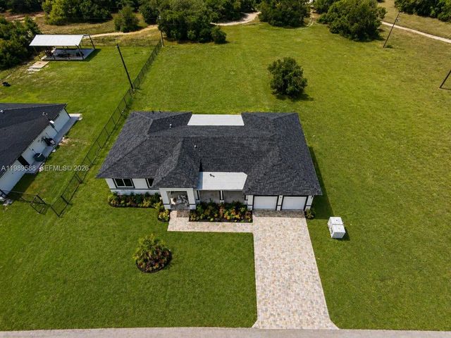 1715 Mcarthur Avenue, Lehigh Acres, FL 33972