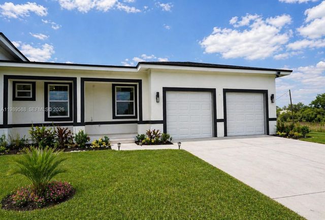 1715 Mcarthur Avenue, Lehigh Acres, FL 33972
