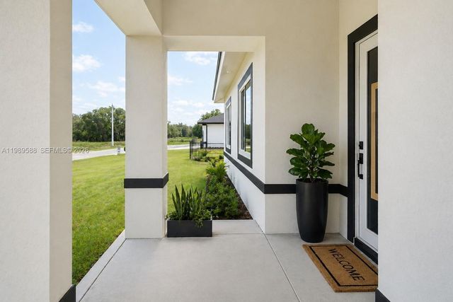 1715 Mcarthur Avenue, Lehigh Acres, FL 33972