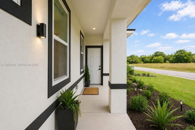 1715 Mcarthur Avenue, Lehigh Acres, FL 33972