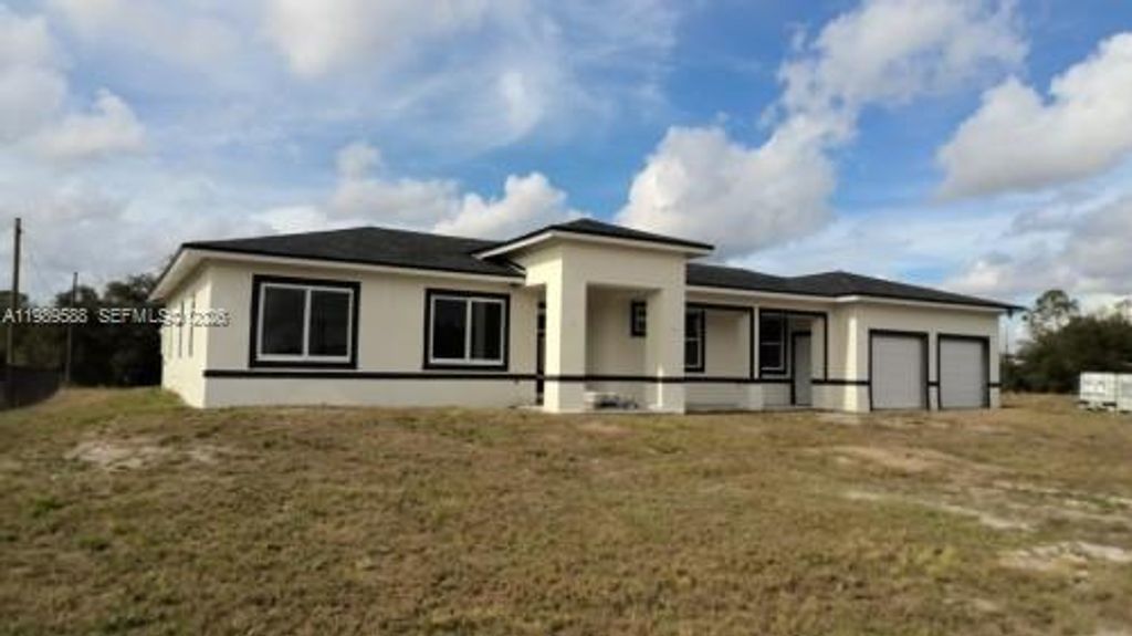 1715 Mcarthur Avenue, Lehigh Acres, FL 33972