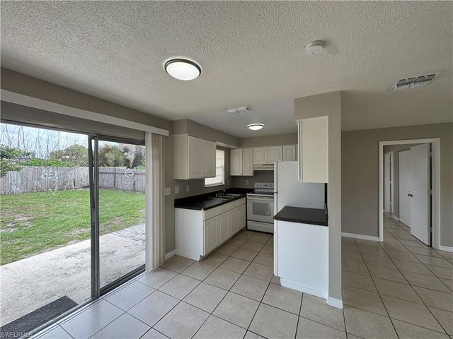 1112 Gifford AVE S, Lehigh Acres, FL 33936