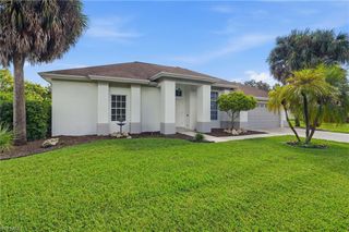 571 Chamonix AVE S, Lehigh Acres, FL 33974