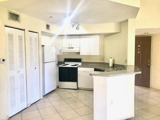 741 N Pine Island Road 303, Plantation, FL 33324