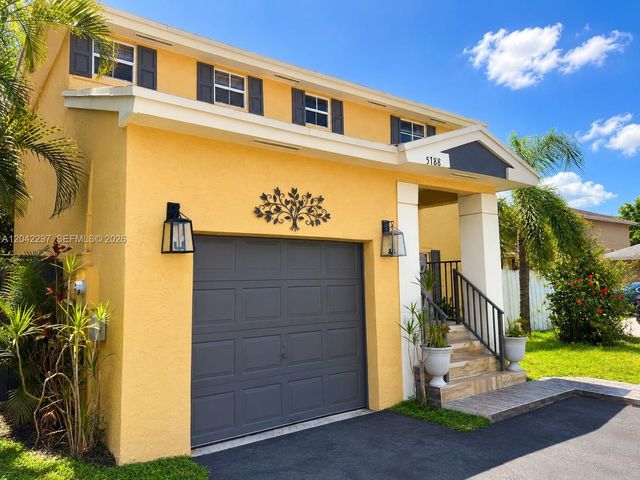 5788 Woodland Point Dr, Tamarac, FL 33319
