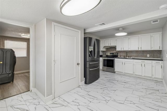 1614 E MAPLE AVENUE, Tampa, FL 33604