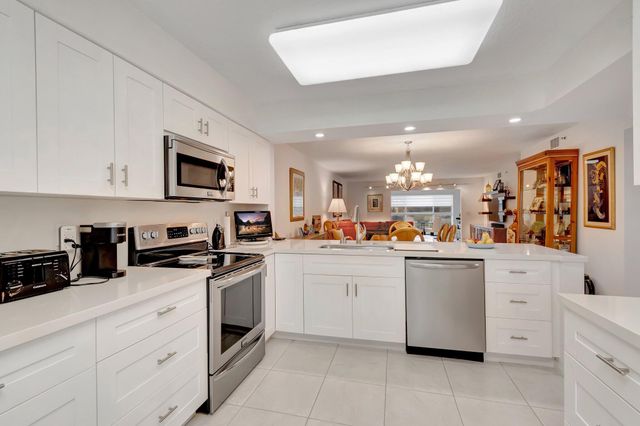 5746 CRYSTAL SHORES Drive 103, Boynton Beach, FL 33437