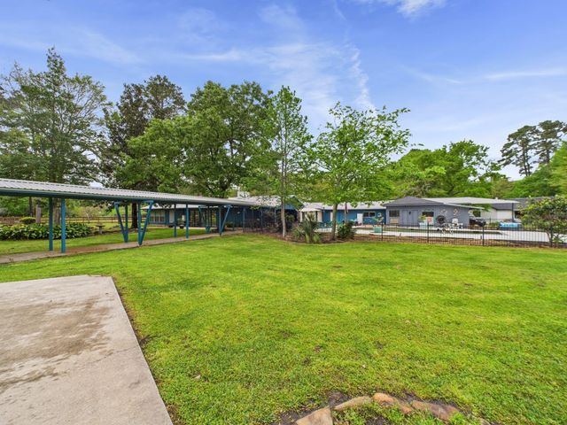 1310 Golden Bear Lane, Kingwood, TX 77339