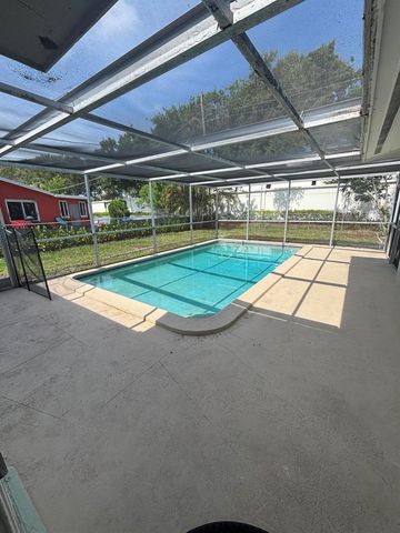 9109 BAMBOO Drive, Palm Beach Gardens, FL 33410