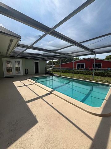 9109 BAMBOO Drive, Palm Beach Gardens, FL 33410