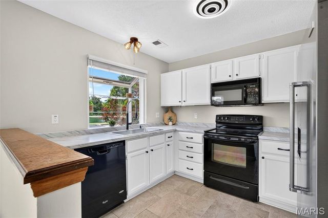 1401 Hemingway Lane H, Weldon Spring, MO 63304