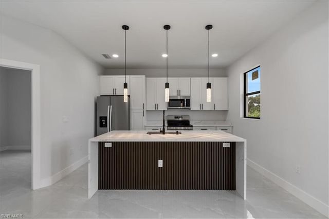 717-719 Gilbert AVE S, Lehigh Acres, FL 33973