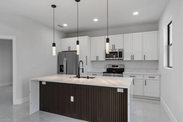 717-719 Gilbert AVE S, Lehigh Acres, FL 33973